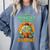 Halloween Teacher Librarian Monster Reading Books Men Women Kids Comfort Colors Sweatshirt Blue Jean