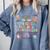 The Tired Teachers Department Retro Groovy Back To School Comfort Colors Sweatshirt Blue Jean
