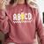 ABCD Teacher Comfort Colors Sweatshirt Crimson ABCD Teacher Comfort Colors Sweatshirt Crimson