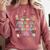 The Tired Teachers Department Retro Groovy Back To School Comfort Colors Sweatshirt Crimson