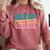 Never Underestimate A Public School Teacher Groovy Women Comfort Colors Sweatshirt Crimson Never Underestimate A Public School Teacher Groovy Women Comfort Colors Sweatshirt Crimson