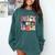 Trick Or Teach Retro Groovy Halloween Teacher Comfort Colors Sweatshirt Blue Spruce