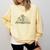 A New Chapter Begins Retired 2026 Teacher Retirement Comfort Colors Sweatshirt Butter A New Chapter Begins Retired 2026 Teacher Retirement Comfort Colors Sweatshirt Butter