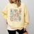 The Tired Teachers Department Retro Groovy Back To School Comfort Colors Sweatshirt Butter
