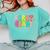 First Grade Team Teacher Back To School 1st Grade Squad Kids Comfort Colors Sweatshirt Chalky Mint