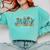 Groovy Tiny Human Tamer Floral Kindergarten Teacher Comfort Colors Sweatshirt Chalky Mint