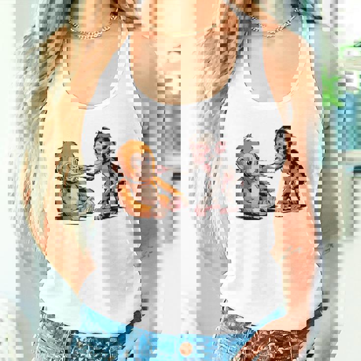 オレンジのおもちゃで悲しい猿のパンチ タンクトップ