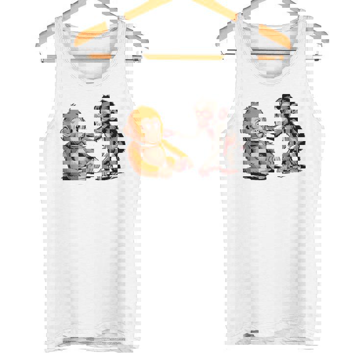 オレンジのおもちゃで悲しい猿のパンチ タンクトップ