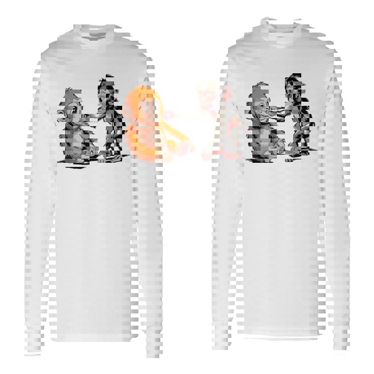 オレンジのおもちゃで悲しい猿のパンチ 長袖Tシャツ