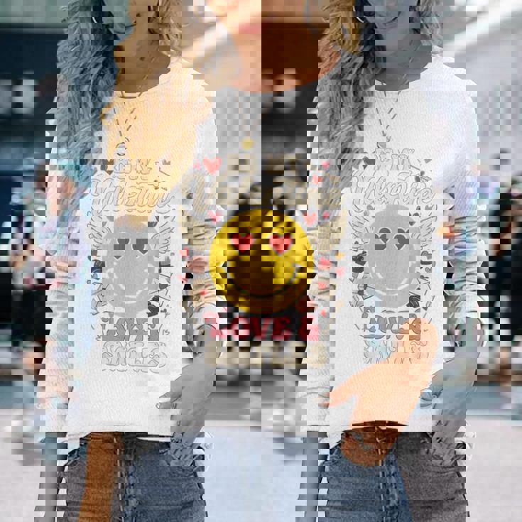 バレンタイン スマイルフェイス ハート 翼 かわいい 愛 チョコレート 長袖Tシャツ 彼女への贈り物