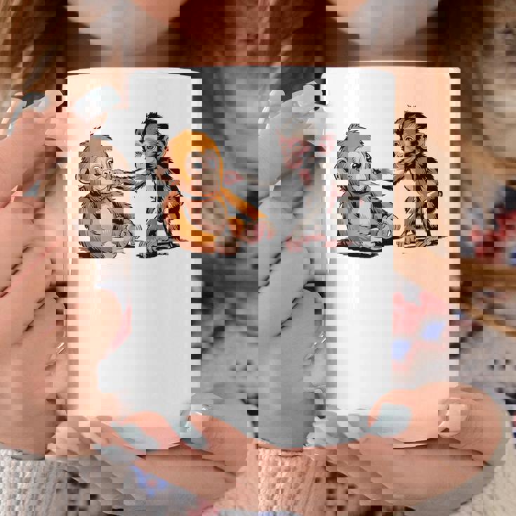 オレンジのおもちゃで悲しい猿のパンチ コーヒーマグ 面白い贈り物