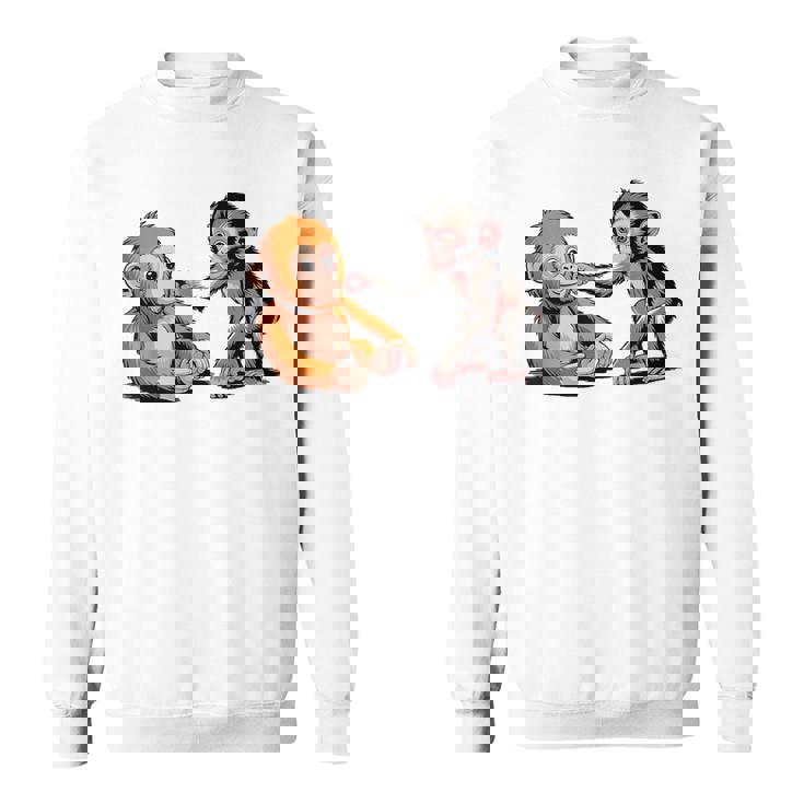 オレンジのおもちゃで悲しい猿のパンチ スウェットシャツ