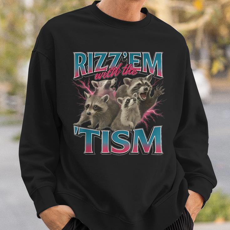 Rizz Em With The Tism Meme Autism Autistic Raccoon Sweatshirt - Monsterry