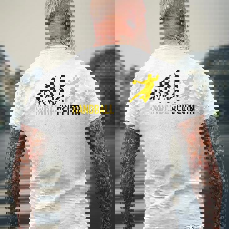 ハンドボール選手の進化ハンドボール メンズTシャツ バックプリント 高齢者への贈り物