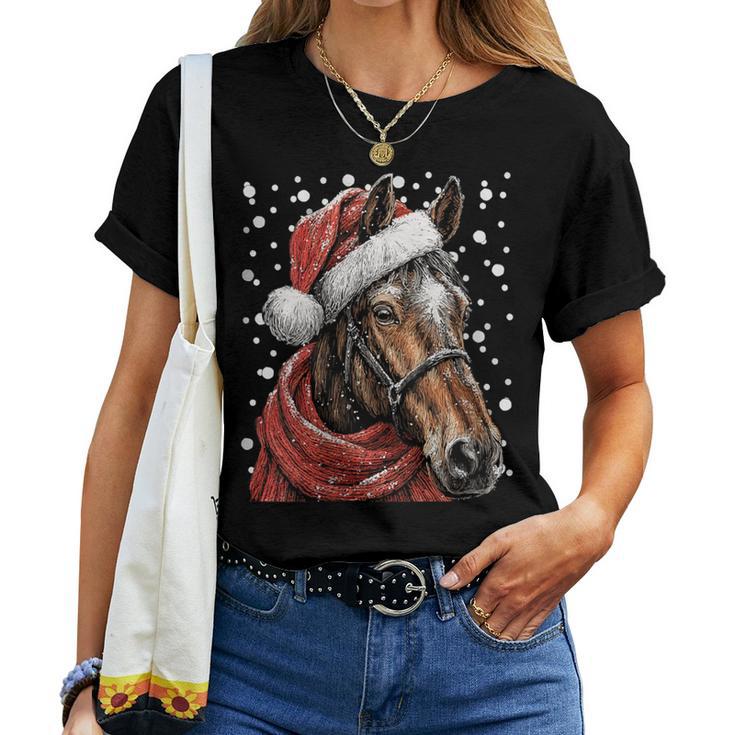 Cheval Enneigé Avec Bonnet De Père Noël D'hiver T-shirt femme