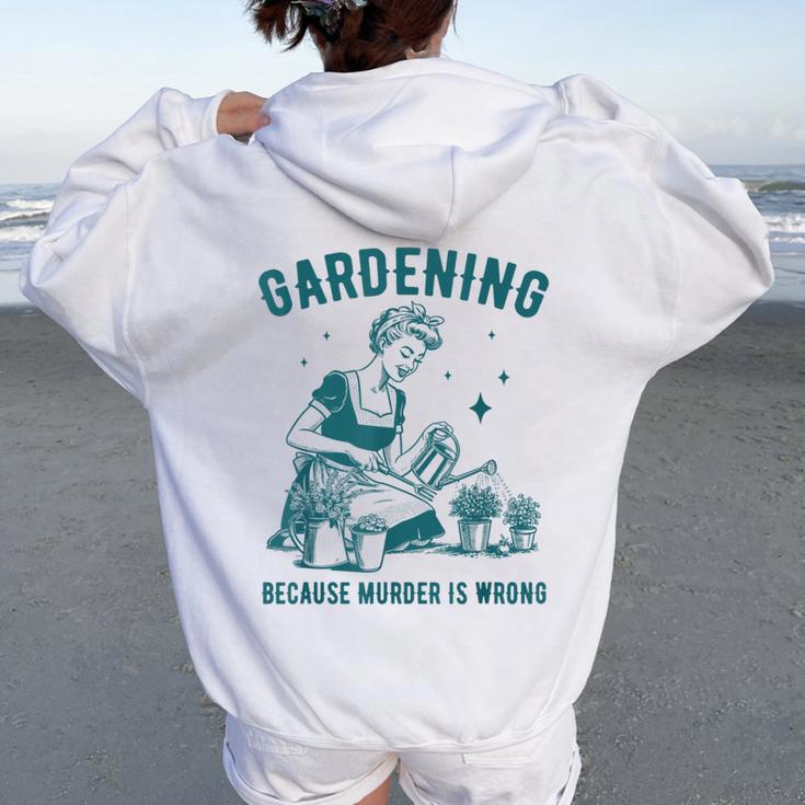 Une Rétro Jardinant Est Drôle Parce Que Le Meurtre Est Une Erreur Sweat à capuche oversize pour femme avec imprimé dans le dos