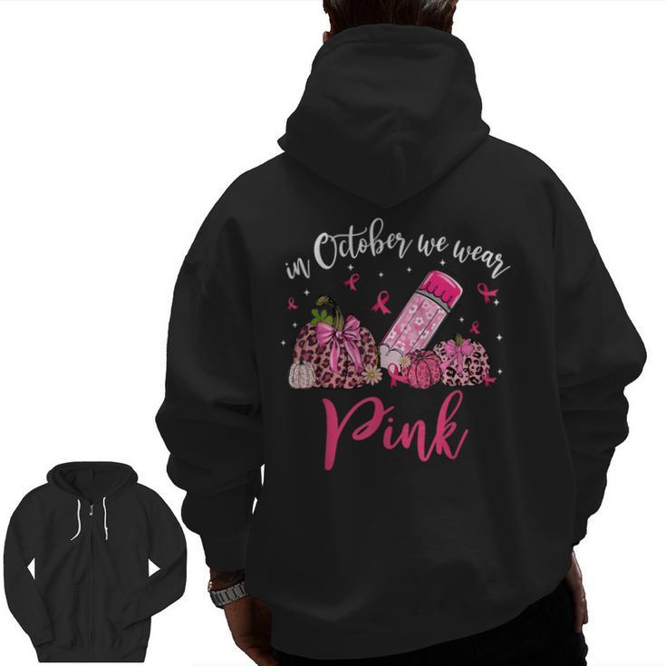 In October We Wear Pink Apple Teacher Daisy Breast Cancer Men Zip Up Hoodie Back Print