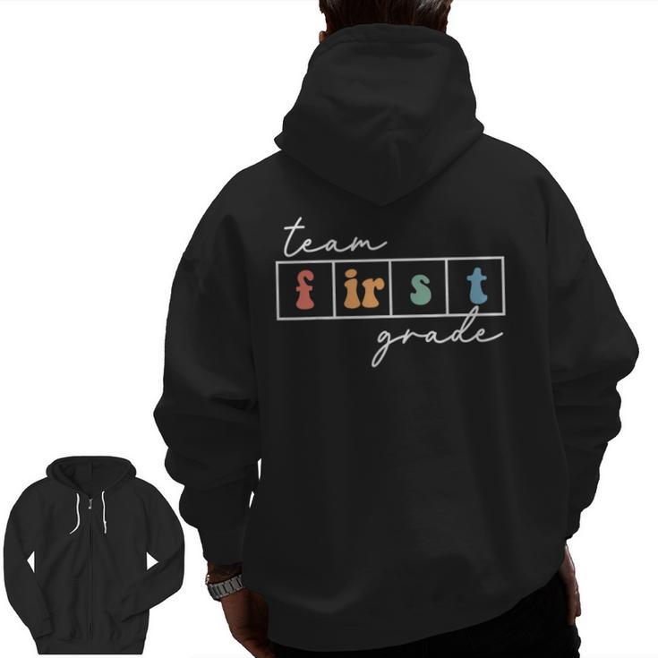 Team First Grade Back To School 1st Grade Teacher Kids Cute Men Zip Up Hoodie Back Print