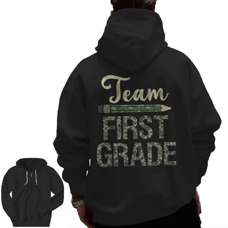 Team First Grade Camo 1st Grade Teacher Camouflage Men Zip Up Hoodie Back Print
