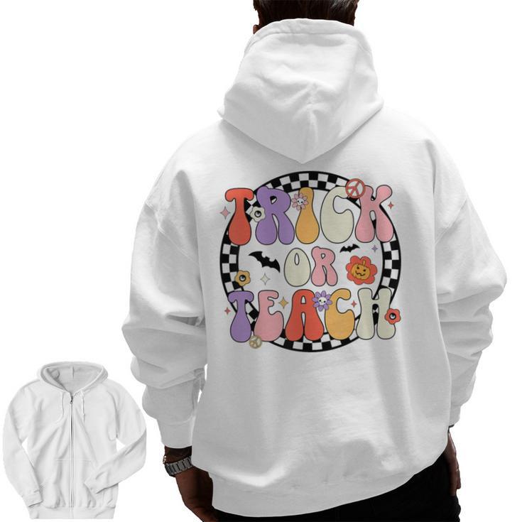 Trick Or Teach Retro Groovy Halloween Teacher Men Zip Up Hoodie Back Print