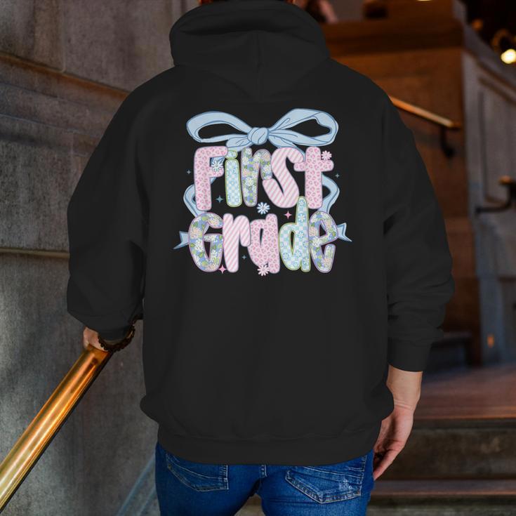 First Grade Coquette Bow Girls Teacher Team 1st Grade Squad Men Zip Up Hoodie Back Print, First Grade Teacher Hoodies, funny gift First Grade Coquette Bow Girls Teacher Team 1st Grade Squad Men Zip Up Hoodie Back Print, First Grade Teacher Hoodies, funny gift
