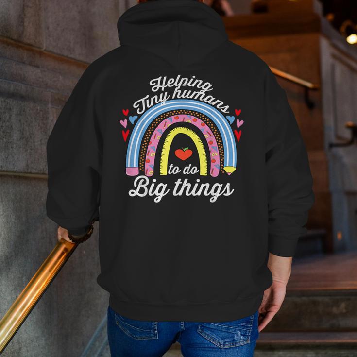 Helping Tiny Humans To Do Big Things Teacher Women Men Zip Up Hoodie Back Print, funny gift