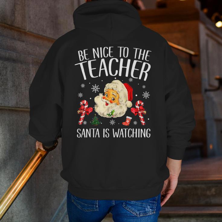 Be Nice To The Teacher Santa Is Watching School Christmas Men Zip Up Hoodie Back Print, funny gift Be Nice To The Teacher Santa Is Watching School Christmas Men Zip Up Hoodie Back Print, funny gift