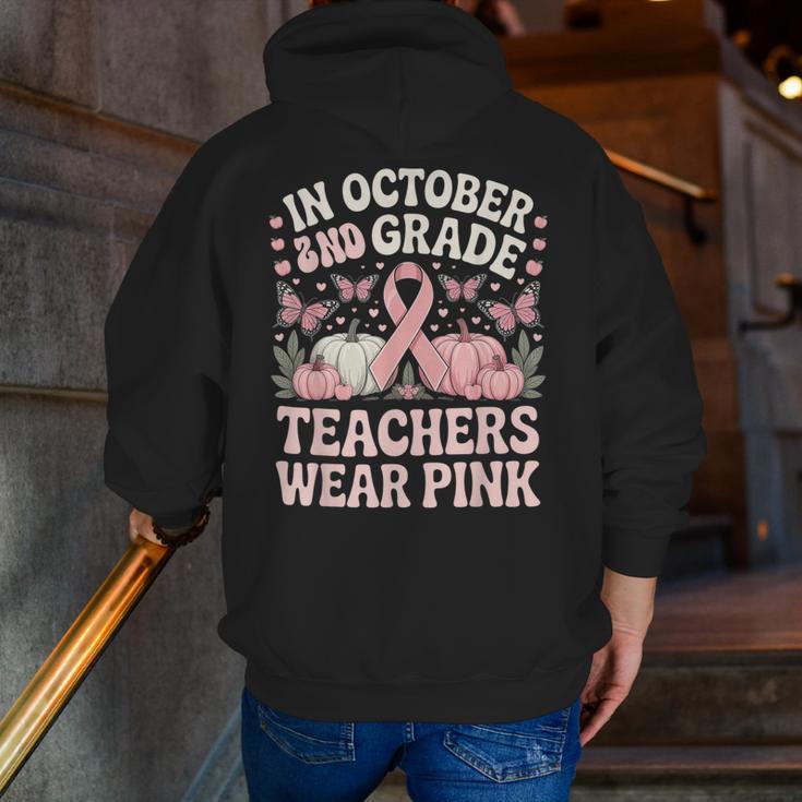 In October 2nd Grade Teachers Wear Pink Ribbon Breast Cancer Men Zip Up Hoodie Back Print, funny gift
