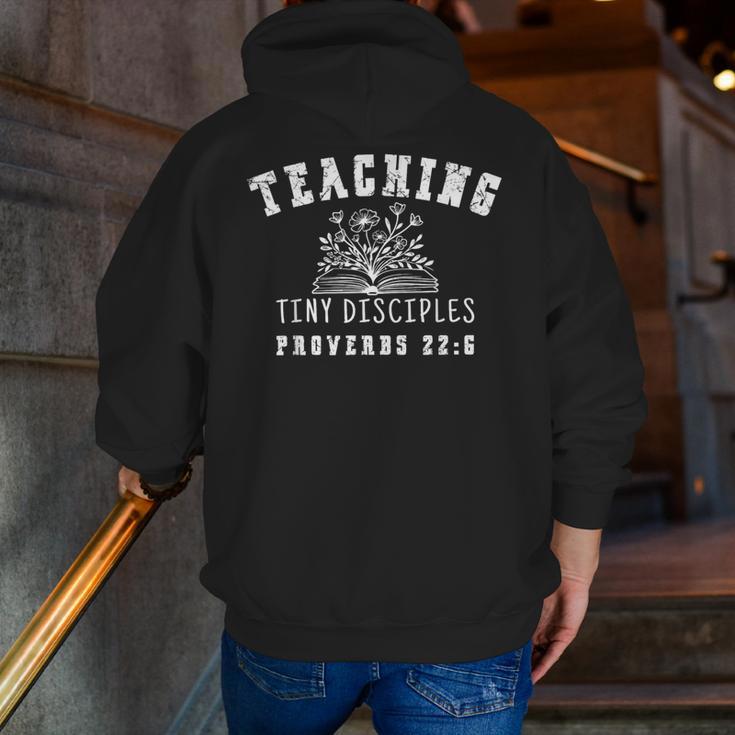Teaching Tiny Disciples Christian Bible Verse Teacher Men Zip Up Hoodie Back Print, funny gift Teaching Tiny Disciples Christian Bible Verse Teacher Men Zip Up Hoodie Back Print, funny gift