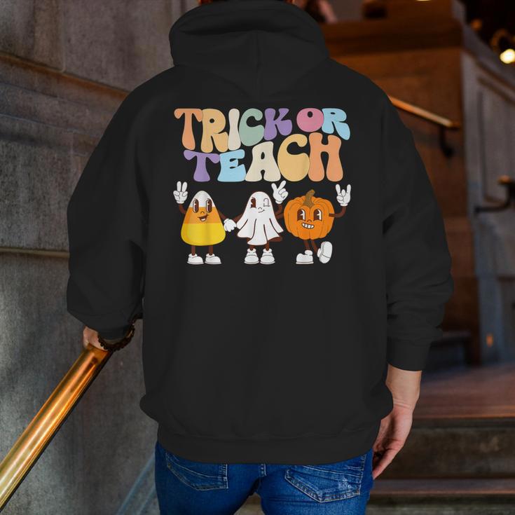Trick Or Teach Cute Halloween Teacher Men Zip Up Hoodie Back Print, funny gift Trick Or Teach Cute Halloween Teacher Men Zip Up Hoodie Back Print, funny gift
