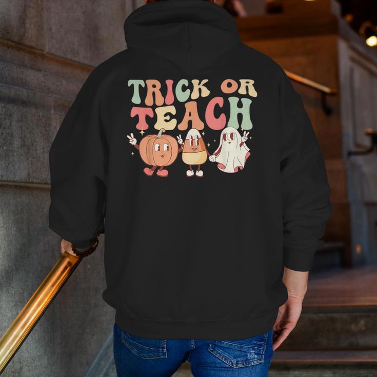 Trick Or Teach Pumpkin Candy Corn Ghost Halloween Teacher Men Zip Up Hoodie Back Print, funny gift Trick Or Teach Pumpkin Candy Corn Ghost Halloween Teacher Men Zip Up Hoodie Back Print, funny gift