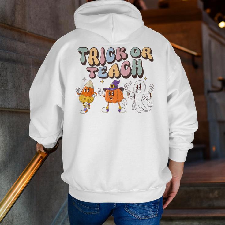 Trick Or Teach Candy Corn Pumpkin Ghost Teacher Men Zip Up Hoodie Back Print, funny gift Trick Or Teach Candy Corn Pumpkin Ghost Teacher Men Zip Up Hoodie Back Print, funny gift