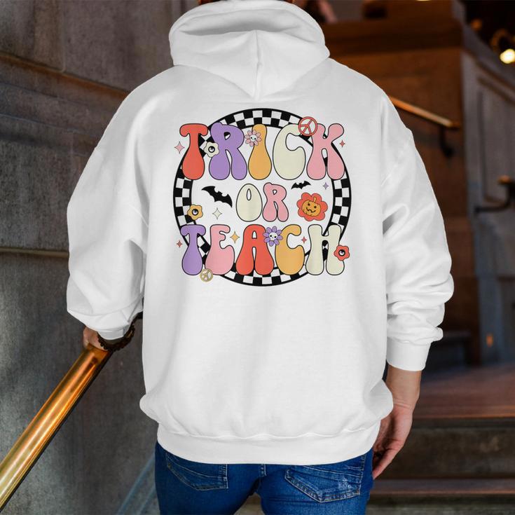 Trick Or Teach Retro Groovy Halloween Teacher Men Zip Up Hoodie Back Print, Groovy Teacher Hoodies, funny gift