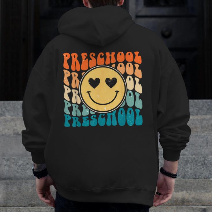 Back To School Groovy Smile Preschool Teachers Students Kids Men Zip Up Hoodie Back Print, funny design