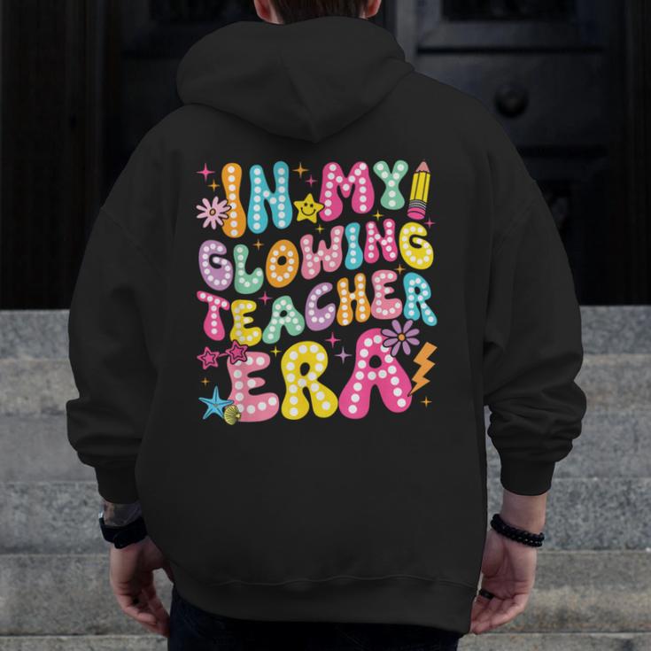 In My Glowing Teacher Era Teaching Back To School Men Zip Up Hoodie Back Print, funny design In My Glowing Teacher Era Teaching Back To School Men Zip Up Hoodie Back Print, funny design