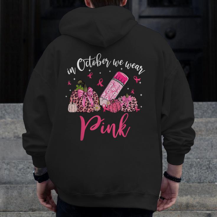 In October We Wear Pink Apple Teacher Daisy Breast Cancer Men Zip Up Hoodie Back Print, funny design In October We Wear Pink Apple Teacher Daisy Breast Cancer Men Zip Up Hoodie Back Print, funny design