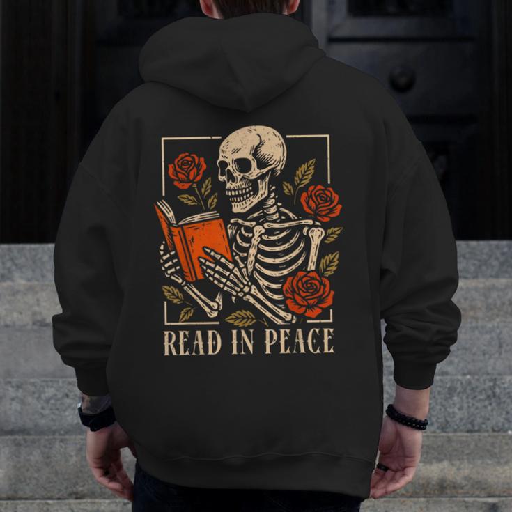 Read In Peace Skeleton Reading Book Halloween Teacher Men Zip Up Hoodie Back Print, funny design Read In Peace Skeleton Reading Book Halloween Teacher Men Zip Up Hoodie Back Print, funny design