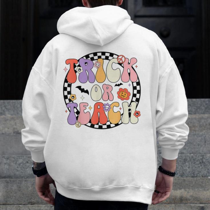 Trick Or Teach Retro Groovy Halloween Teacher Men Zip Up Hoodie Back Print, Groovy Teacher Gifts, funny design