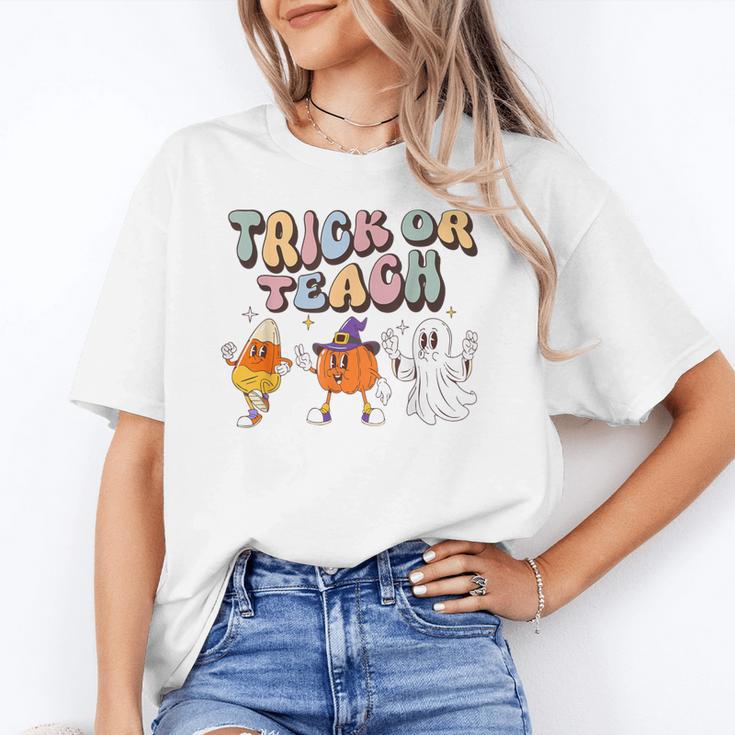 Trick Or Teach Candy Corn Pumpkin Ghost Teacher Unisex T-Shirt, funny gift Trick Or Teach Candy Corn Pumpkin Ghost Teacher Unisex T-Shirt, funny gift