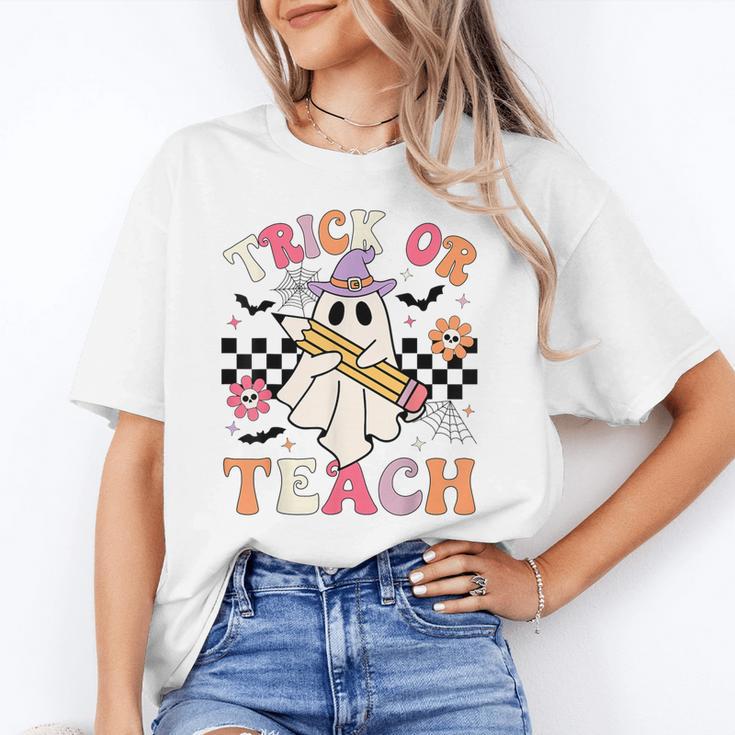 Trick Or Teach Groovy Teacher Halloween Retro Floral Ghost Unisex T-Shirt, Groovy Teacher Shirts, funny gift Trick Or Teach Groovy Teacher Halloween Retro Floral Ghost Unisex T-Shirt, Groovy Teacher Shirts, funny gift