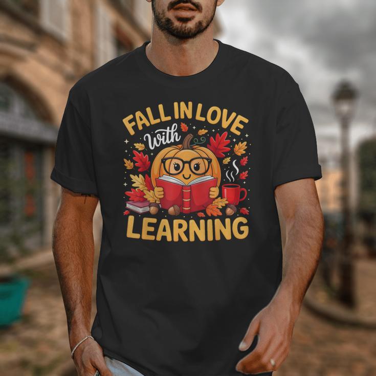 Fall In Love With Learning Pumpkin Thanksgiving Teacher Fall Unisex T-Shirt, funny design