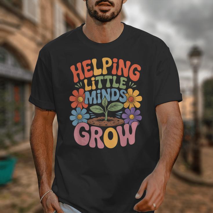 Helping Little Minds Grow Teacher First Day Back To School Unisex T-Shirt, funny design Helping Little Minds Grow Teacher First Day Back To School Unisex T-Shirt, funny design