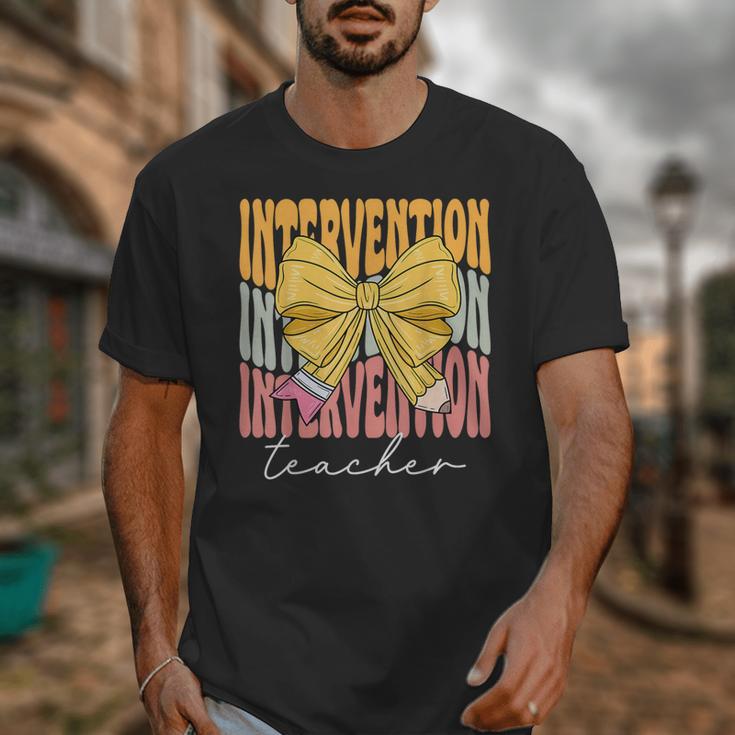Interventionist Teacher Groovy Coquette Bow Back To School Unisex T-Shirt, Groovy Teacher Gifts, funny design