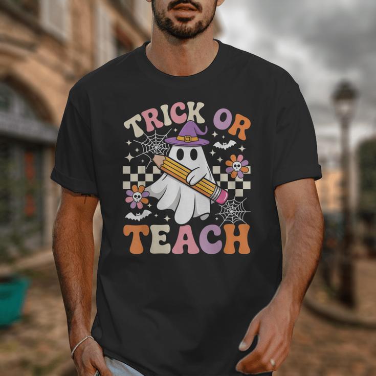 Trick Or Teach Groovy Teacher Halloween Retro Ghost Unisex T-Shirt, Groovy Teacher Gifts, funny design Trick Or Teach Groovy Teacher Halloween Retro Ghost Unisex T-Shirt, Groovy Teacher Gifts, funny design