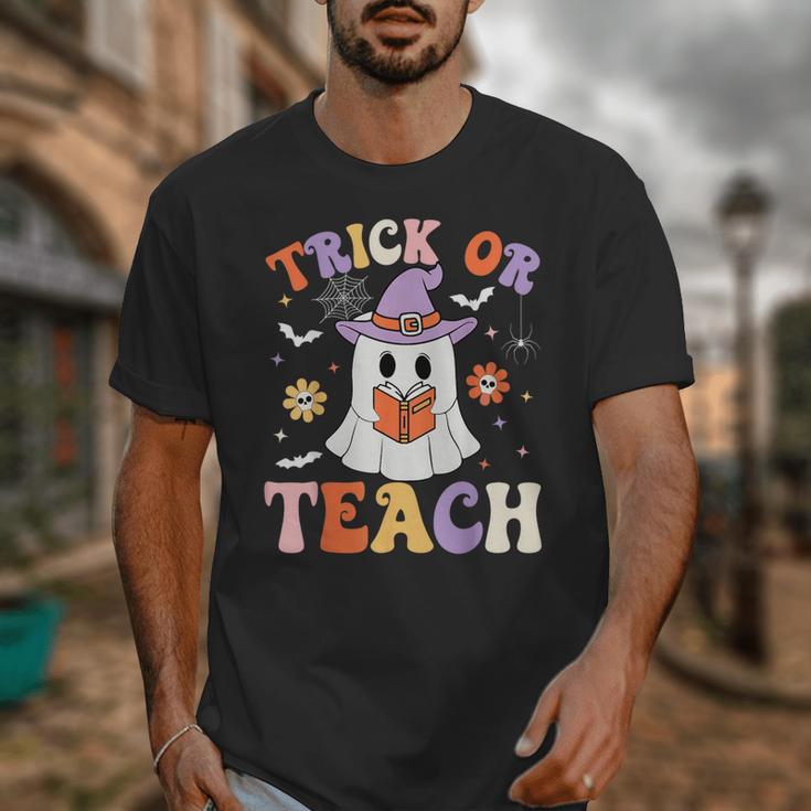 Trick Or Teach Teacher Groovy Ghost Halloween Teacher Unisex T-Shirt, Groovy Teacher Gifts, funny design Trick Or Teach Teacher Groovy Ghost Halloween Teacher Unisex T-Shirt, Groovy Teacher Gifts, funny design