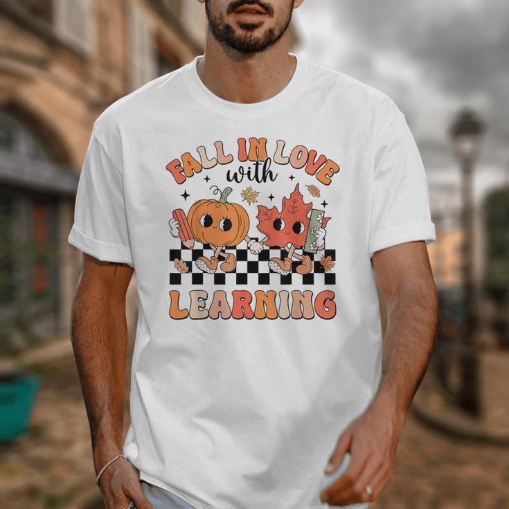 Retro Fall In Love With Learning Autumn Pumpkin Teacher Unisex T-Shirt, funny design Retro Fall In Love With Learning Autumn Pumpkin Teacher Unisex T-Shirt, funny design