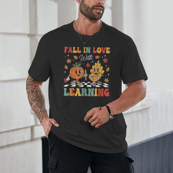 Groovy Fall In Love With Learning Autumn Pumpkin Teacher Unisex T-Shirt, novelty gifts, funny gifts