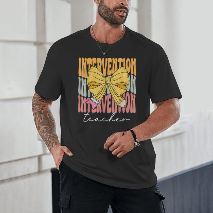 Interventionist Teacher Groovy Coquette Bow Back To School Unisex T-Shirt, novelty gifts, funny gifts