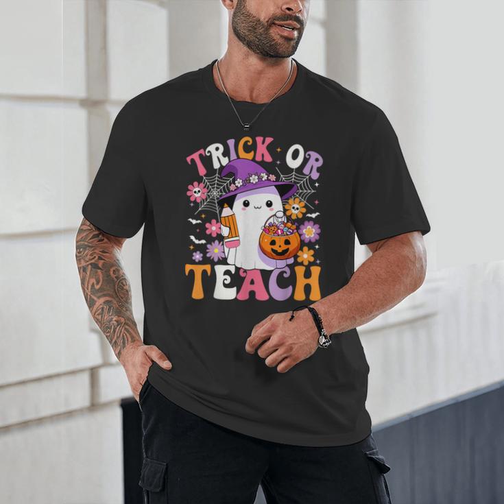 Trick Or Teach Groovy Teacher Ghost Halloween Teacher Unisex T-Shirt, novelty gifts, funny gifts
