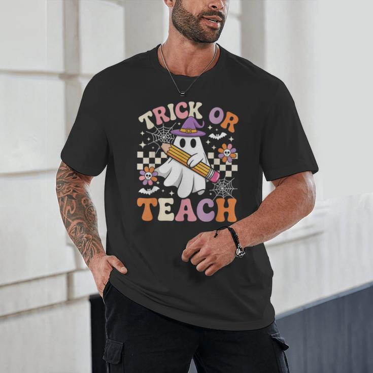 Trick Or Teach Groovy Teacher Halloween Retro Ghost Unisex T-Shirt, novelty gifts, funny gifts Trick Or Teach Groovy Teacher Halloween Retro Ghost Unisex T-Shirt, novelty gifts, funny gifts